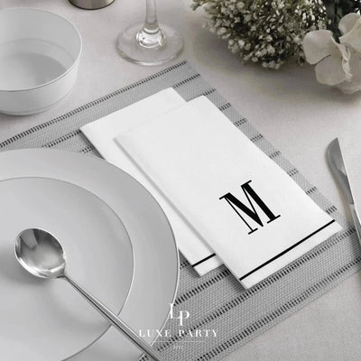 SET DE 14 SERVILLETAS DE PAPEL PARA INVITADOS LETRA M - BLANCAS Y NEGRO